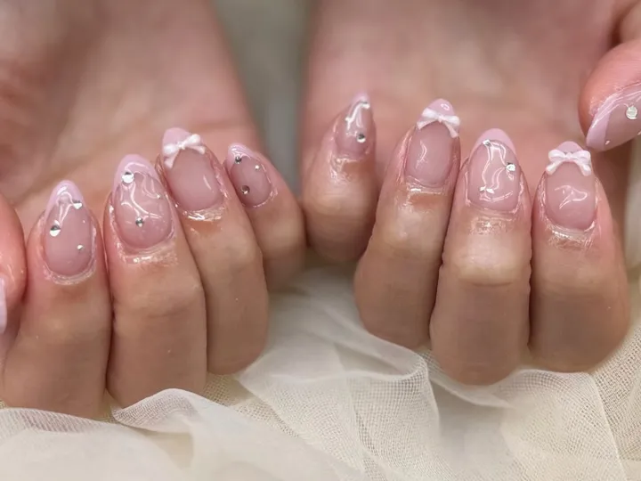 ピンクリボンストーンニュアンス｜リボンネイル・ビジューネイル・ニュアンスネイル・ブライダルネイル