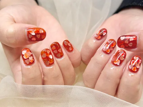赤地の花柄ネイル｜フラワー、レッド、ホワイト、イエロー、可愛い
