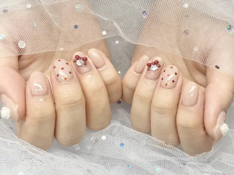 ベージュピンクのハートリボン｜ワンカラー、ドット、リボン、ベージュ、ピンク、レッド、可愛い、上品・大人
