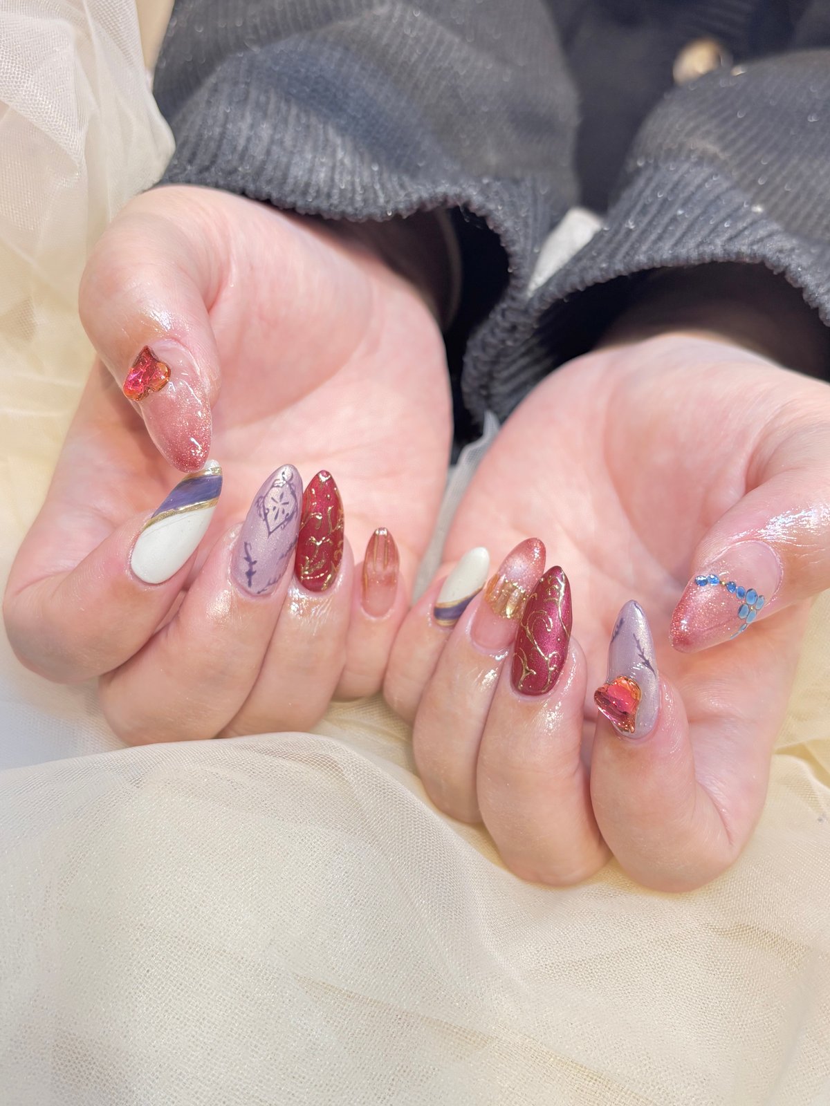 NICENAILのお客様施術 ボルドー×レッドのラメグリッターネイル