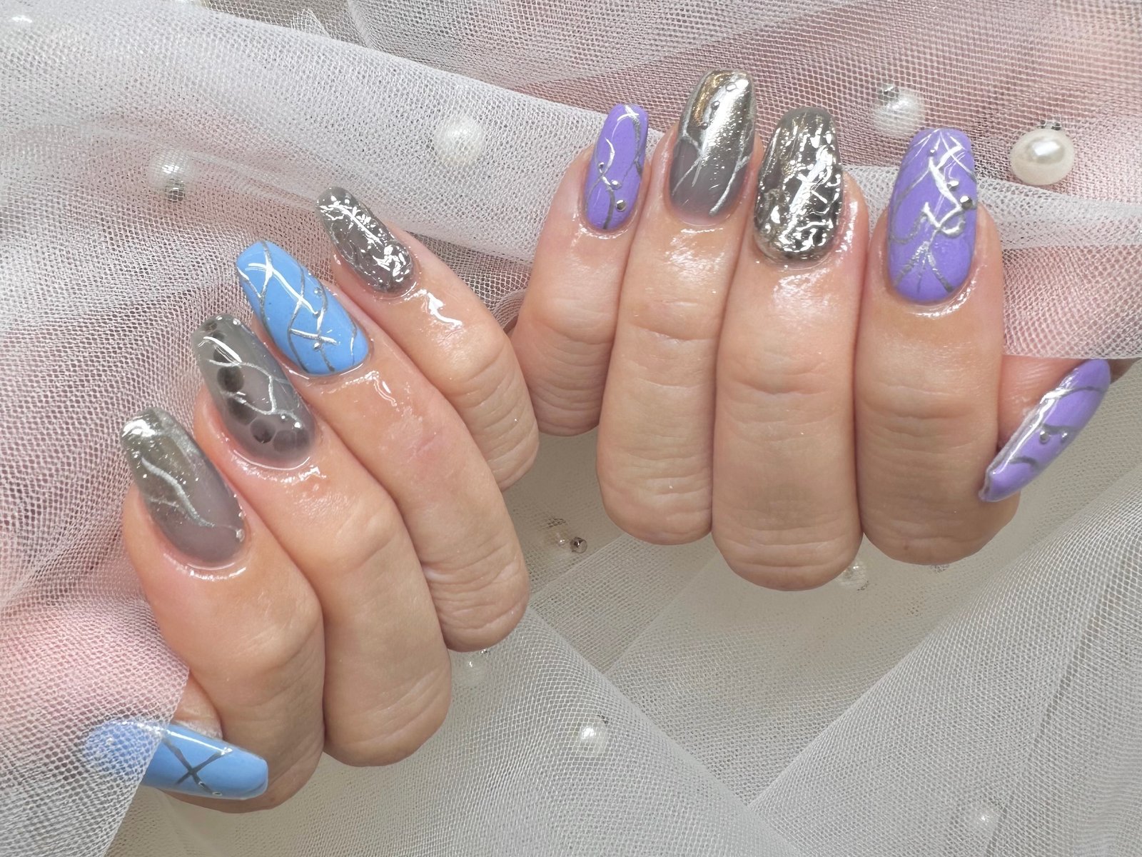 NICENAILのお客様施術 紫×青のミラークロームデザイン