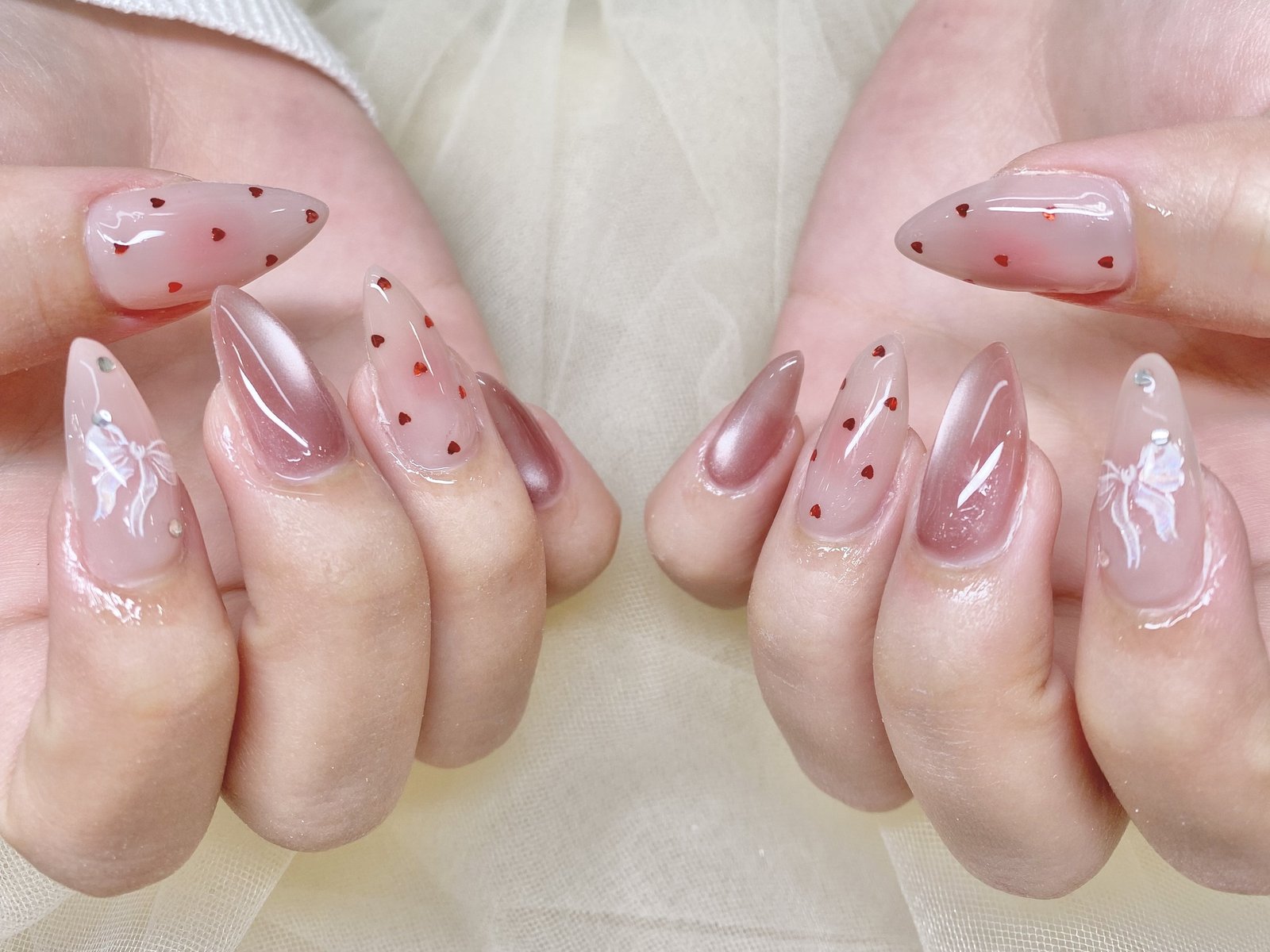 NICENAILのお客様施術 くすみピンクのドット×シアー