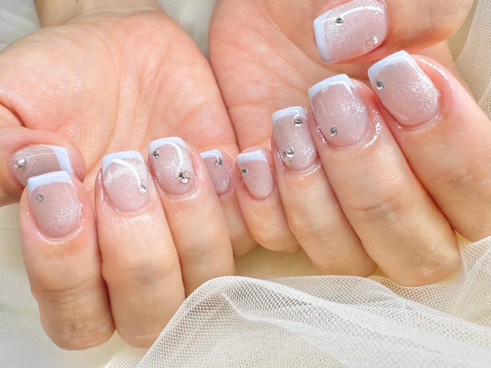 NICENAILのお客様施術 ベージュピンクのラメグラデーションフレンチ