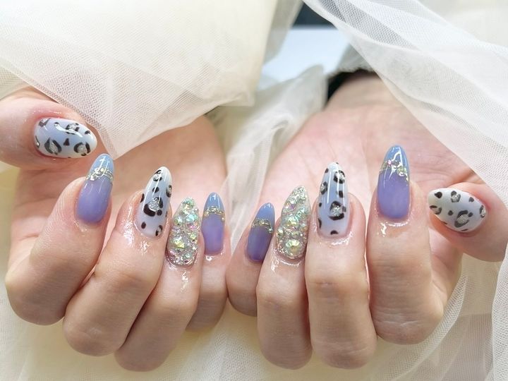 NICENAILのお客様施術 パープルのレオパード×ゴールドラメ