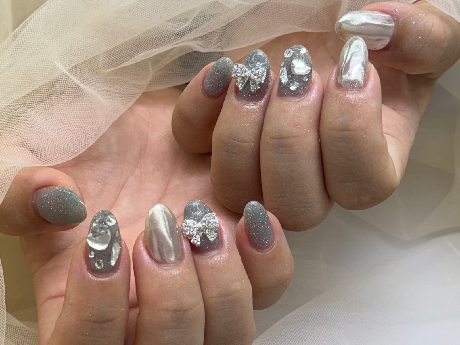 NICENAILのお客様施術 シルバーミラーのビジューデコ